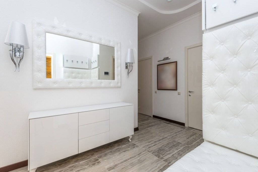 Minimal white interior with clean lines and soft daylight